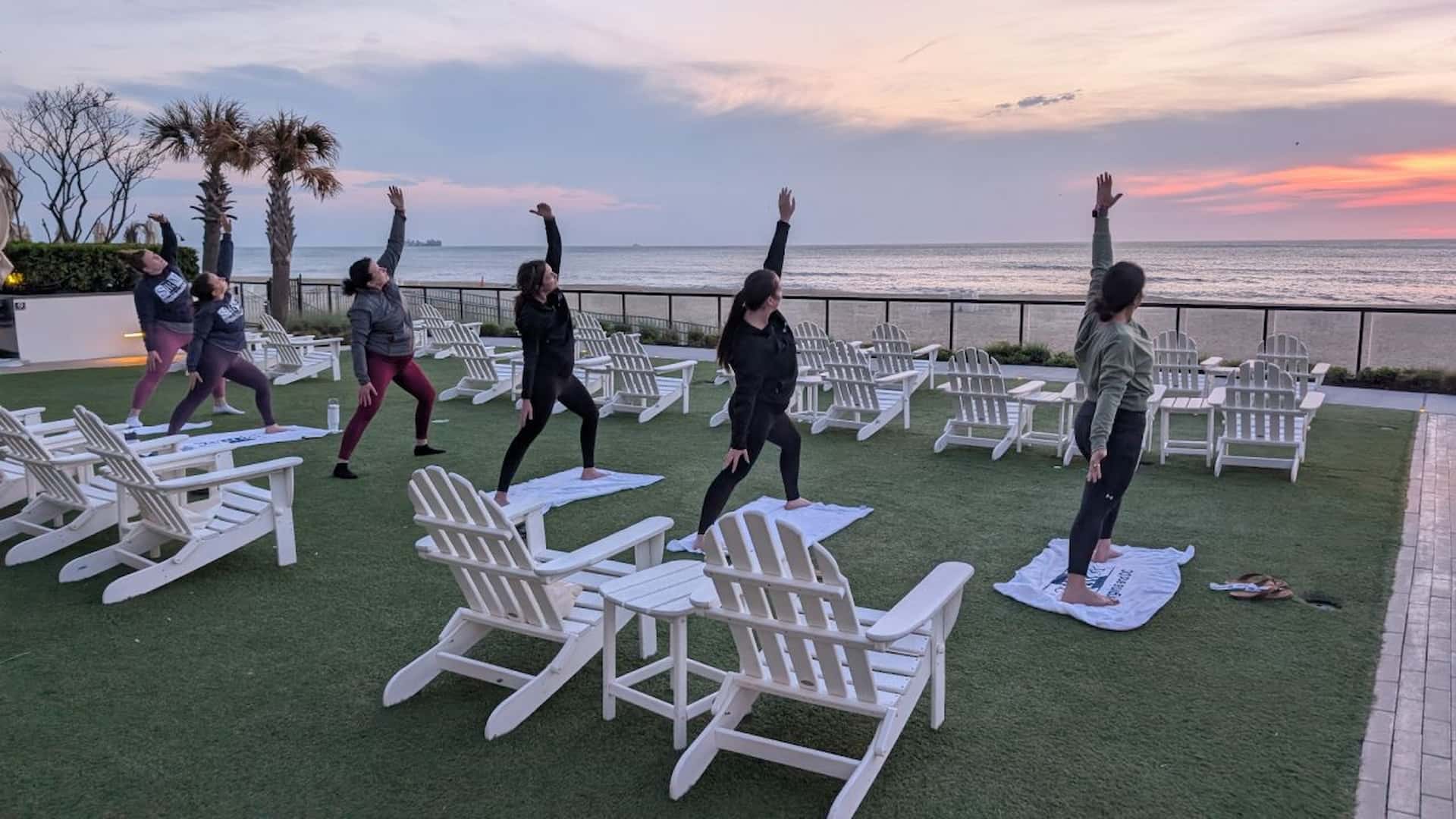 Participants in a WorkLife Wellness Recharge corporate yoga and wellness retreat